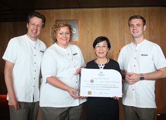 (From left) Hilton Hotel Pattaya’s Michel Scheffers (Director of Operations), Peta Ruiter (Director of Business Development) and Food and Beverage Manager Simon Bender (right), present the prize to Radchada Chomjinda (2nd right), head of the Human Help Network Thailand.